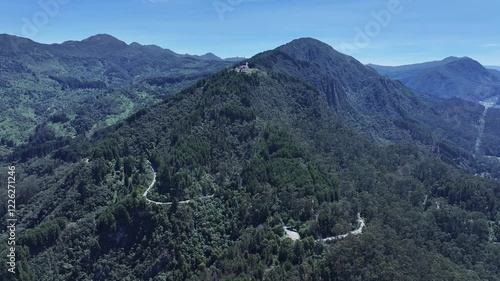 Virgin Of Guadalupe Sanctuary At Bogota District Capital Colombia. Aerial Landscape Of Famous Statue In A Natural Scenery. Countryside Sky Clouds Rural Field. Sky Panoramic. Bogota District Capital. photo