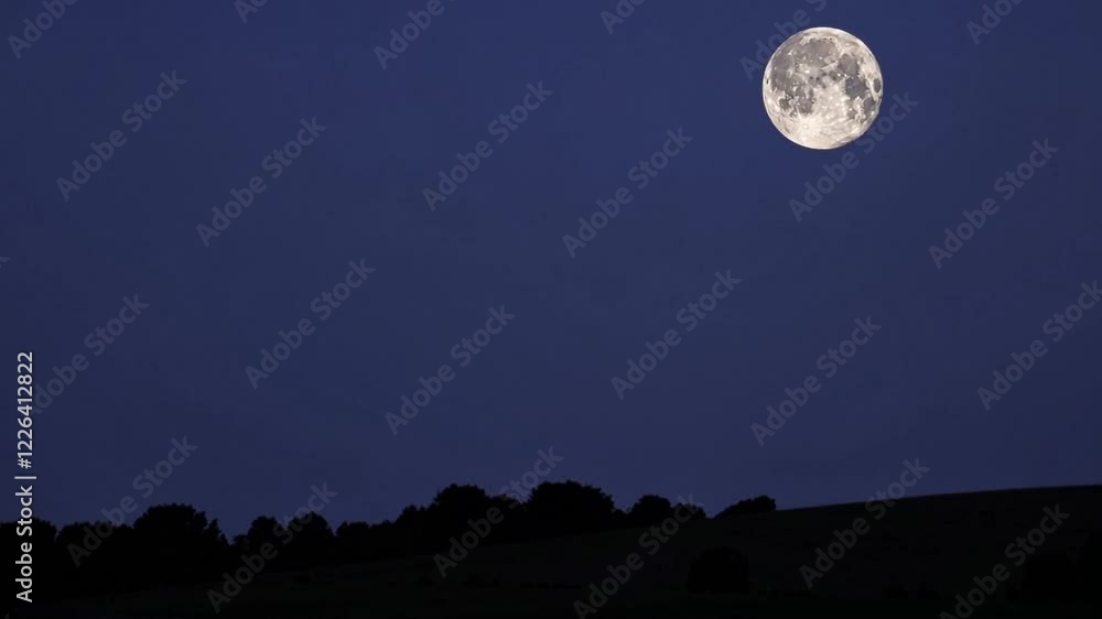 Majestic Full Moon Over Silhouetted Landscape Majestic Full Moon Over Silhouetted Landscape