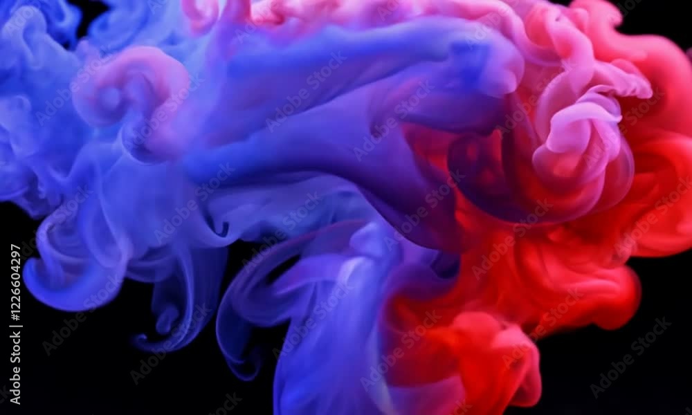 Colorful swirling smoke in vibrant hues of blue and pink against a black background, creating an ethereal atmosphere Colorful swirling smoke in vibrant hues of blue and pink against a black background, creating an ethereal atmosphere