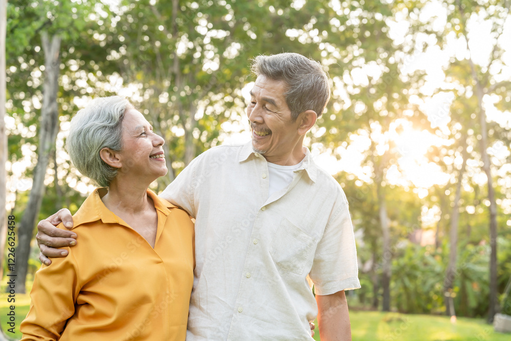 Asian senior elderly couple spend time on romantic date in the garden. Asian senior elderly couple spend time on romantic date in the garden.