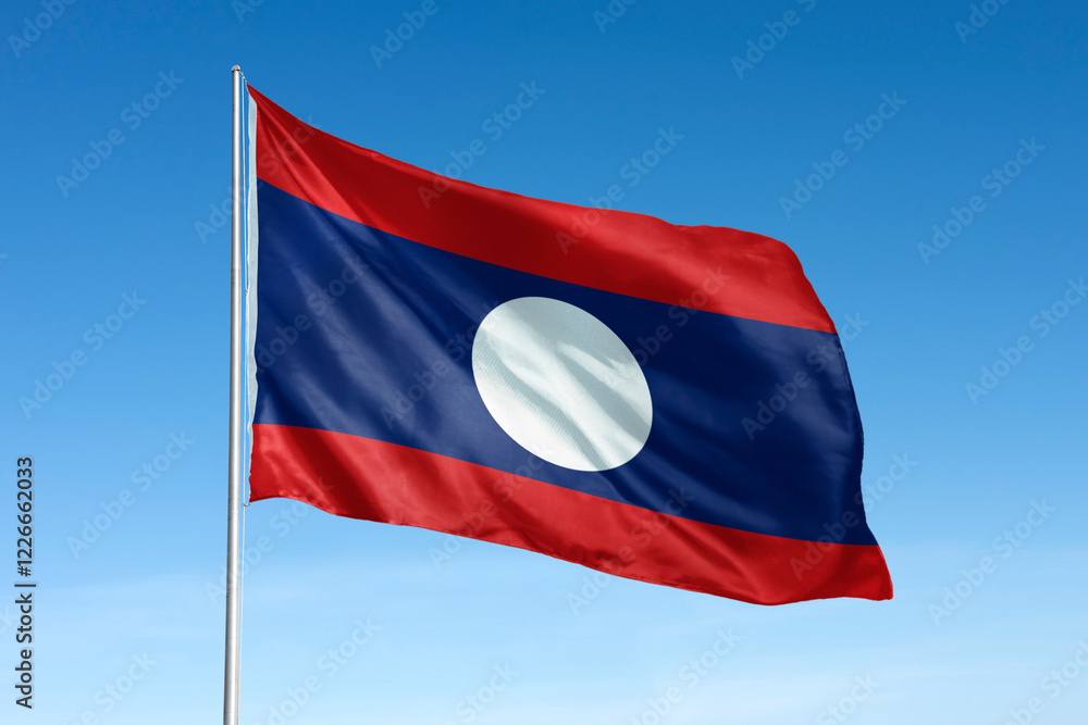 Waving Laos flag, national symbol, blue sky Waving Laos flag, national symbol, blue sky