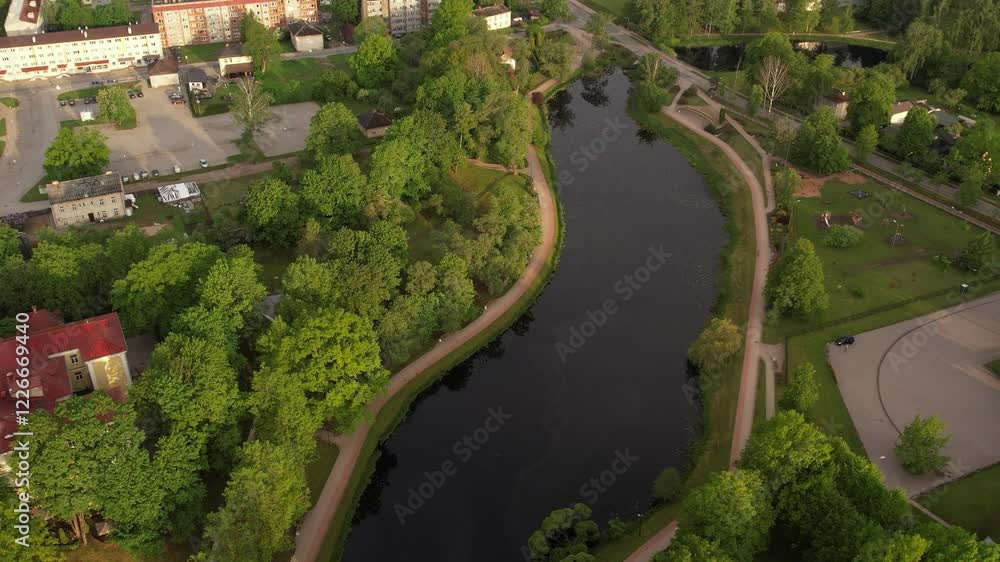 Aerial View of Urban Landscape with River and Green Park. Latvia. City Valmiera Aerial View of Urban Landscape with River and Green Park. Latvia. City Valmiera