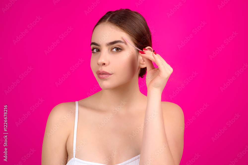 Mascara eyebrows. Natural beauty brows. Eyebrows coloring and lamination. Woman combing eyebrows. Makeup and cosmetology concept. Eyebrow shape modeling. Mascara eyebrows. Natural beauty brows. Eyebrows coloring and lamination. Woman combing eyebrows. Makeup and cosmetology concept. Eyebrow shape modeling.