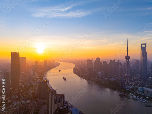 Photography Aerial View of Shanghai skyline at sunrise with the Winding River