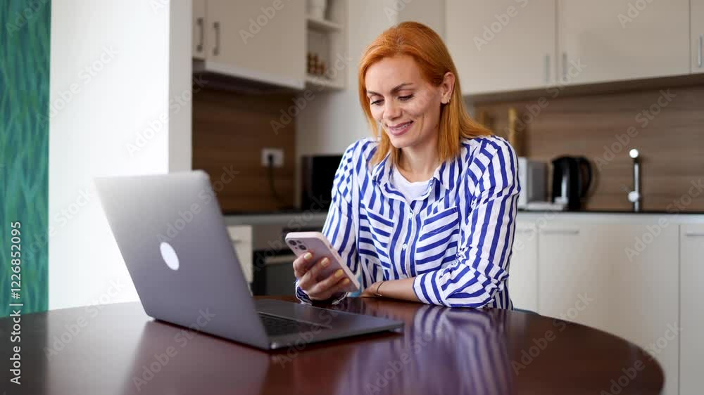 Businesswoman taking a break and surfing the net