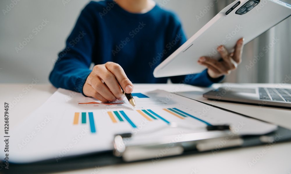 Businesswoman utilizing smartphone and tablet technology. Perfect for corporate, technology, Businesswoman utilizing smartphone and tablet technology. Perfect for corporate, technology,