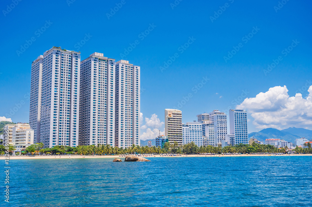 View of Nha Trang in Vietnam, cloudy day. Nha Trang is a popular tourist destination in Asia. View of Nha Trang in Vietnam, cloudy day. Nha Trang is a popular tourist destination in Asia.