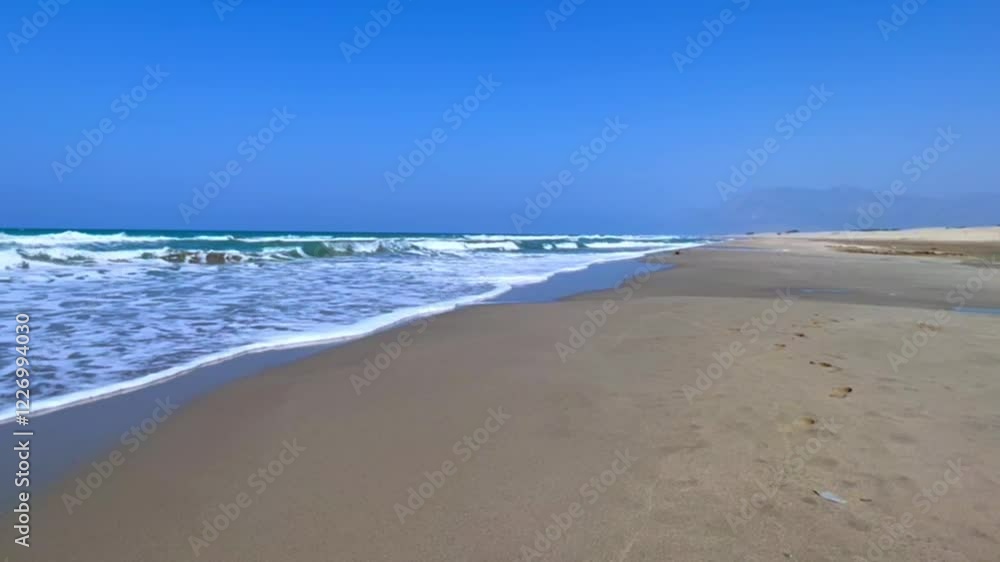 Patara Beach in Turkey is the longest sandy beach in Turkey. Beautiful, very fine sand and turquoise sea. Waves breaking on the sand. The beach with turtles. White foam. The Mediterranean Sea. 4K Patara Beach in Turkey is the longest sandy beach in Turkey. Beautiful, very fine sand and turquoise sea. Waves breaking on the sand. The beach with turtles. White foam. The Mediterranean Sea. 4K