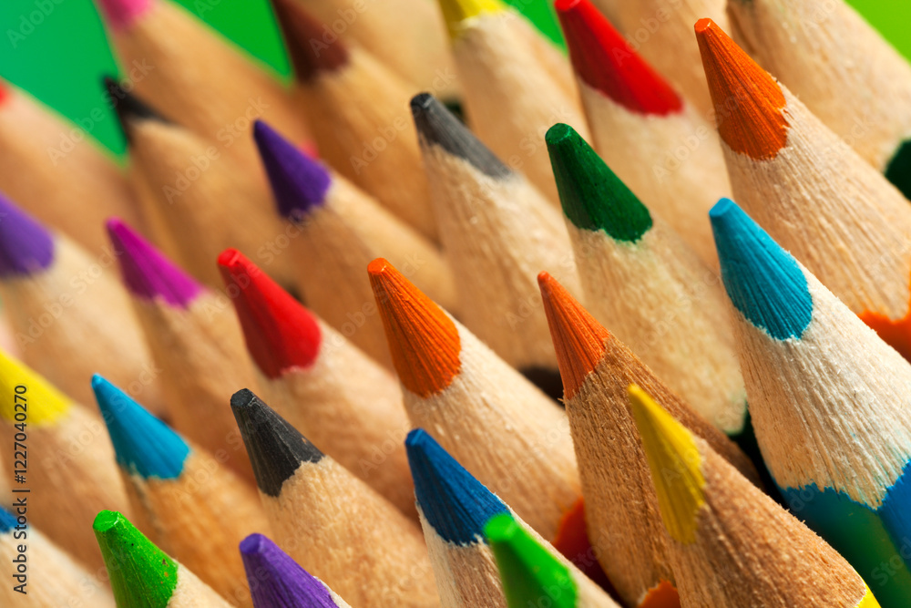 Close-up of multicolored crayon tips, tilted view Close-up of multicolored crayon tips, tilted view