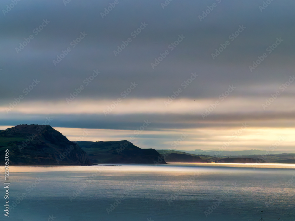 Fototapeta premium Dramatic Unsettled Skies over Dorset England on a December Morning