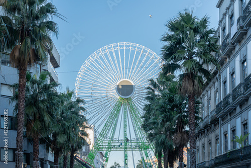 workers dismantling a ferris wheel after Christmas in Vigo