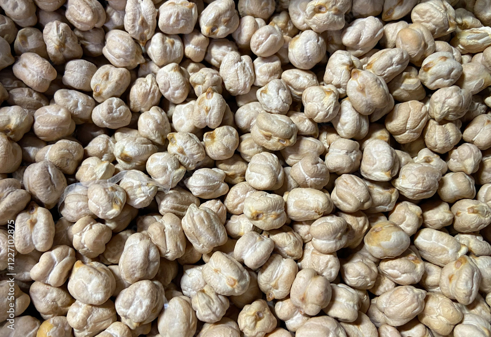 Chick-pea background. Nut is a main ingredient of hummus and many other vegan dishes.Selective focus. Chick-pea background. Nut is a main ingredient of hummus and many other vegan dishes.Selective focus.