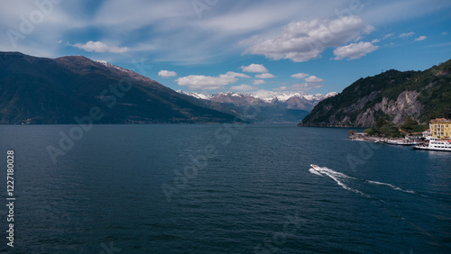 Wallpaper Mural Aerial view of boat trip near Bellano, panoramic view from the drone to the famous old Italy town of Como lake. Near Varenna and Lierna, Bellano is a small town in Como, near Lecco, in Lombardia. Torontodigital.ca