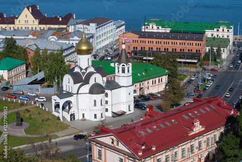 Church of the Kazan Icon of the Mother of God in the urban landscape on a sunny September day. Nizhny Novgorod photo