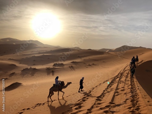 Camel Caravan in the Moroccan Sahara Desert at Sunset