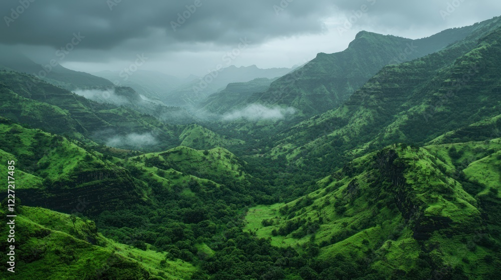 A vast mountain range with lush green valleys and misty peaks in the distance A vast mountain range with lush green valleys and misty peaks in the distance