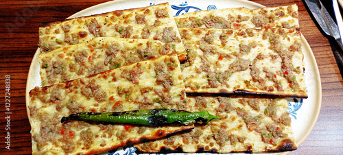 Turkish and Arabic Traditional Ramadan Bread Sliced Etli Ekmek (Pide or Lahmacun) photo