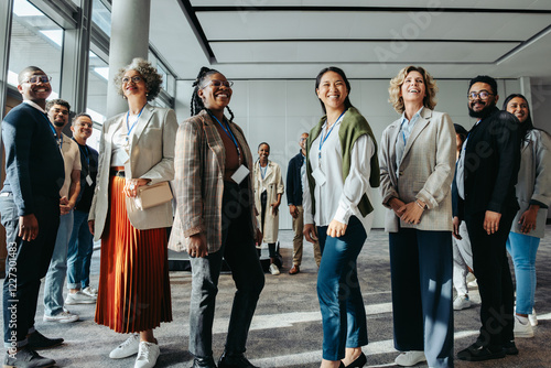 Canvastavla Confident group of diverse professionals attending a seminar in a modern confere