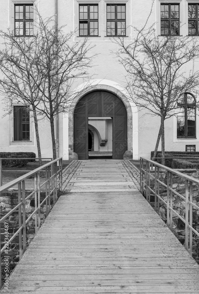 Wooden bridge at Osterstein Castle in black and white photography, Zwickau Saxony Germany vertical Wooden bridge at Osterstein Castle in black and white photography, Zwickau Saxony Germany vertical