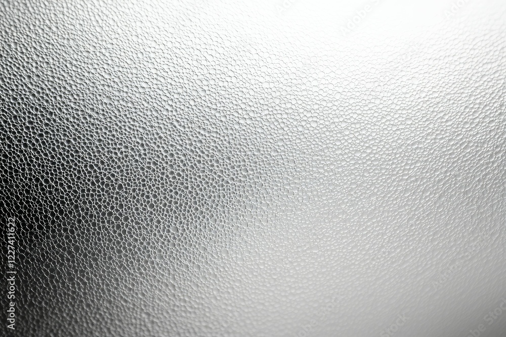 Blurry image of a grey surface with a lot of small dots Blurry image of a grey surface with a lot of small dots