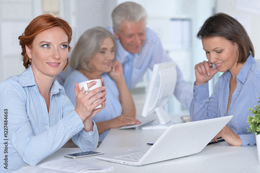 business people colleagues working together in office business people colleagues working together in office