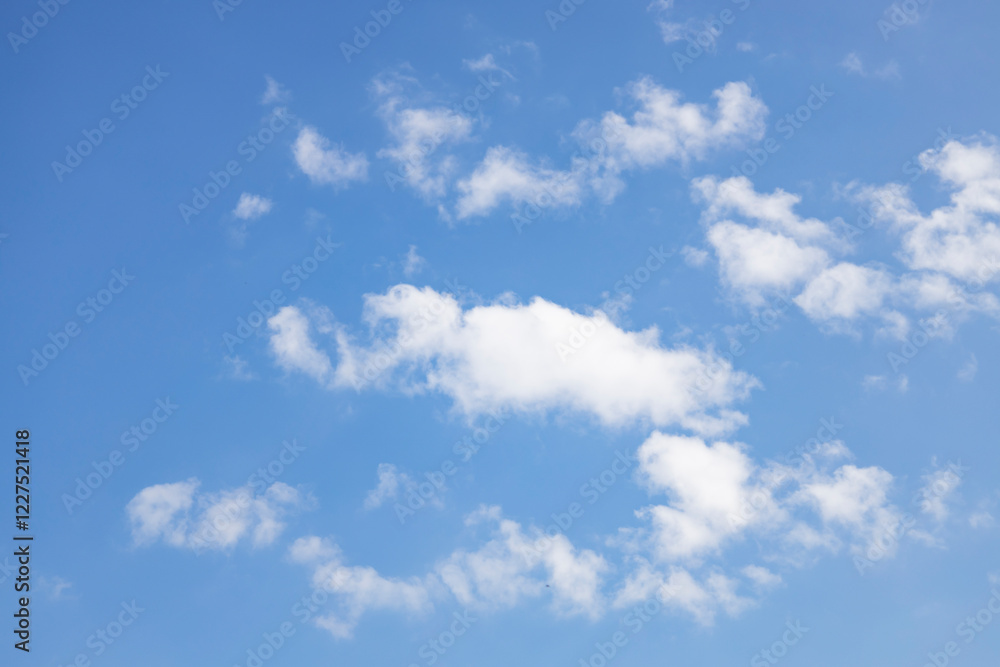 Cloud in the blue sky. A beautiful clouds against the blue sky background. Beautiful cloud pattern in the sky. Cloud in the blue sky. A beautiful clouds against the blue sky background. Beautiful cloud pattern in the sky.