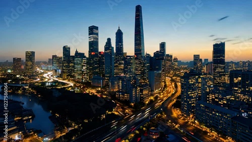 Wallpaper Mural The city skyline comes alive with lights as traffic flows smoothly beneath modern skyscrapers and a tranquil river at dusk, time lapse Torontodigital.ca
