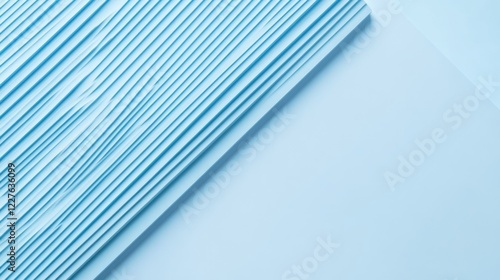 Light blue textured background with a diagonal striped pattern for modern design and creative applications.