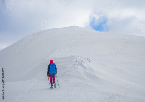 Obraz na płótnie Campo Felice, Italy - The suggestive plateau peak in Abruzzo region, Monte Puzzillo and Morretano summit mount range, during the winter with snow and alpinists in altitude w salonie