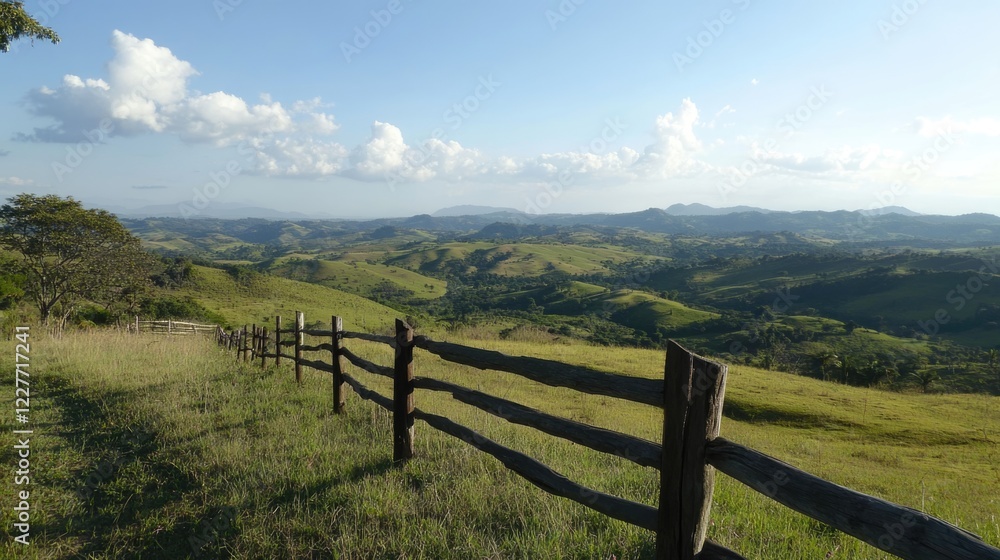 Scenic countryside landscape with rolling hills under a clear blue sky and wooden fence creating a peaceful and inviting atmosphere Scenic countryside landscape with rolling hills under a clear blue sky and wooden fence creating a peaceful and inviting atmosphere
