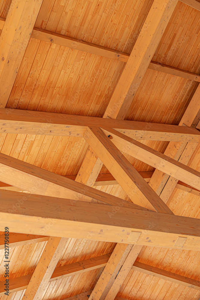 Construction of a wooden roof of a frame house.
