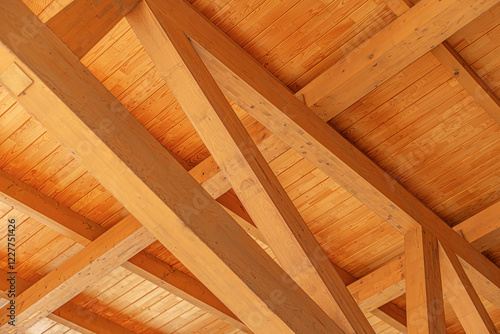 Obraz na płótnie Construction of a wooden roof of a frame house. w salonie