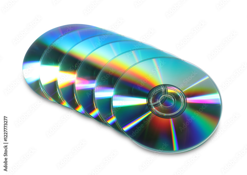 Many shiny compact discs on light background Many shiny compact discs on light background