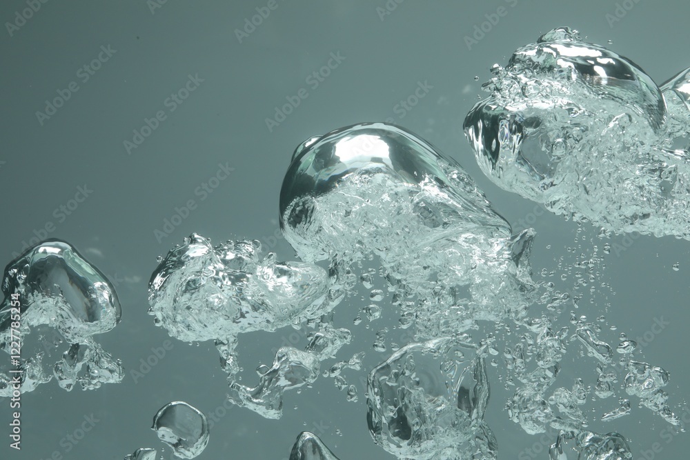 Many water bubbles on grey background, closeup Many water bubbles on grey background, closeup