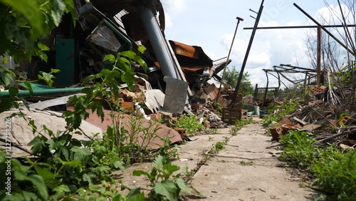 View to destroyed residential buildings at Kharkivska oblast. Ruined houses after bomb attacks on ukrainian territory from russia army. Consequences of russian invasion of Ukraine. Slow motion photo