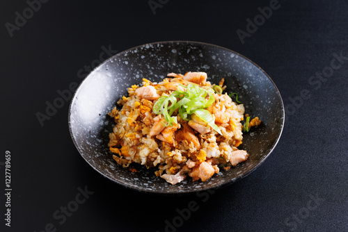 Japanese fried rice yakimeshi isolated in black background