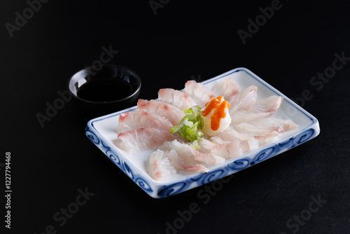Sea bream sashimi Japanese food Japanese seafood isolated in black background