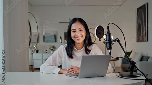 Smiling young caucasian UGC content creator woman with black hair creating content at home