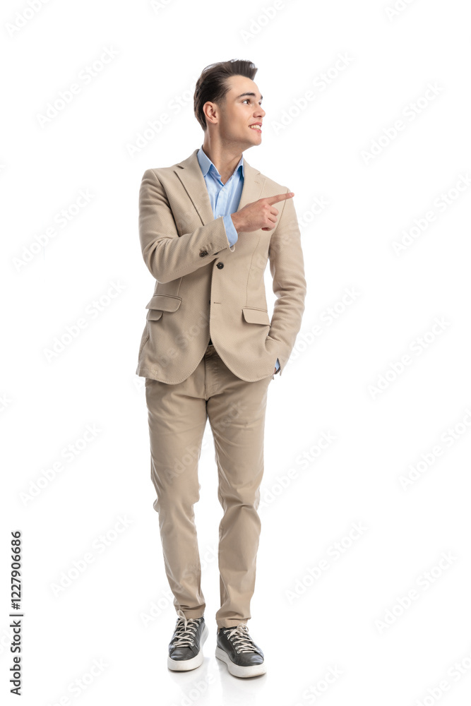 relaxed smart casual man pointing finger and looking to side relaxed smart casual man pointing finger and looking to side
