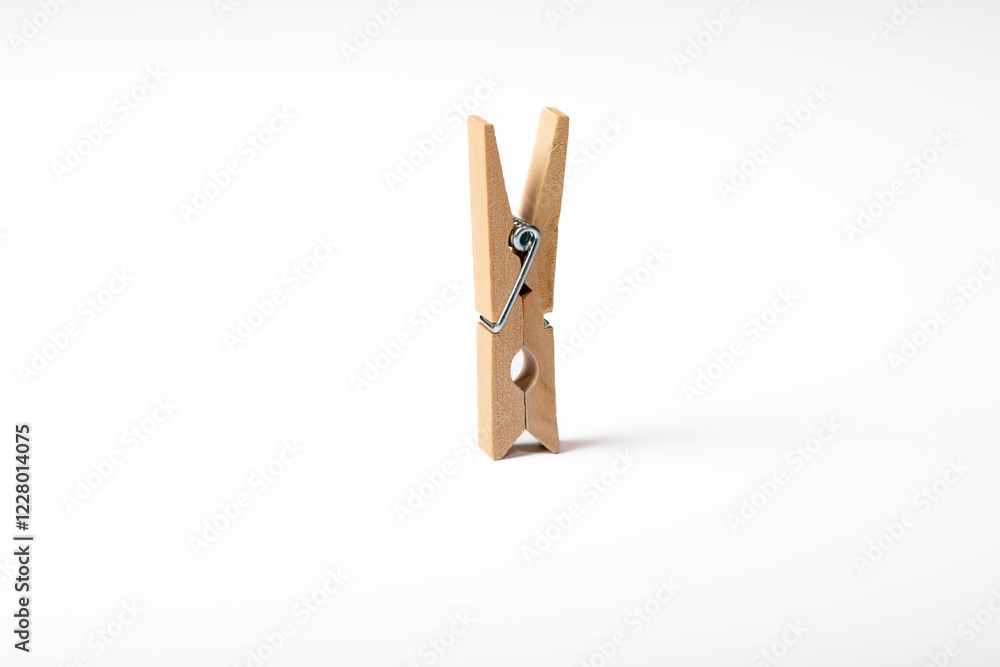 Wooden clothes peg isolated on white background
Wooden clothes peg isolated on white background
