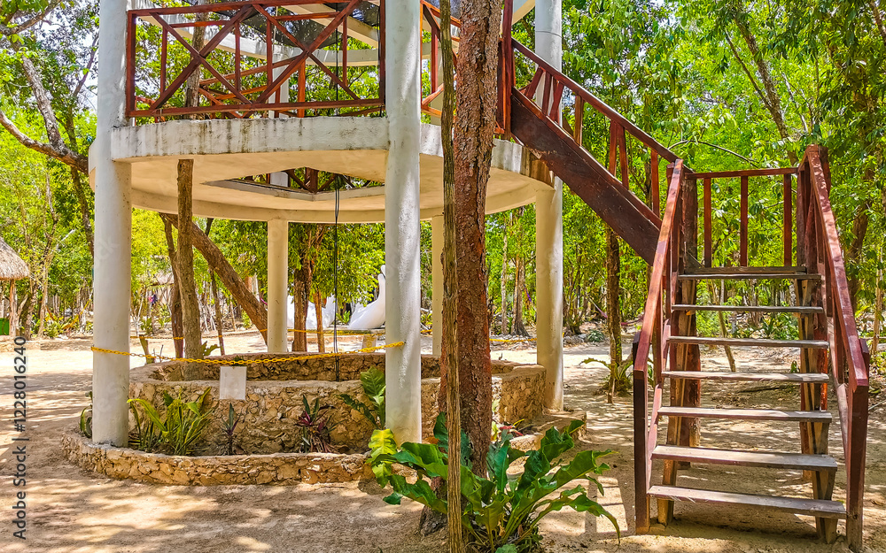 Cenote Park Yaxmuul with limestone rocks rappel tower and nature. Cenote Park Yaxmuul with limestone rocks rappel tower and nature.