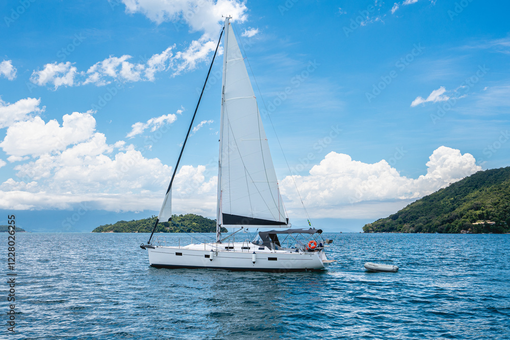 White Sailship in the waters of Paraty, Brazil. White Sailship in the waters of Paraty, Brazil.