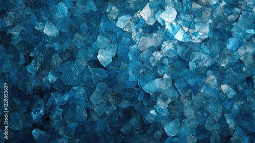 Sparkling ocean water texture with ripples and sunlight reflections in a rich blue hue.
