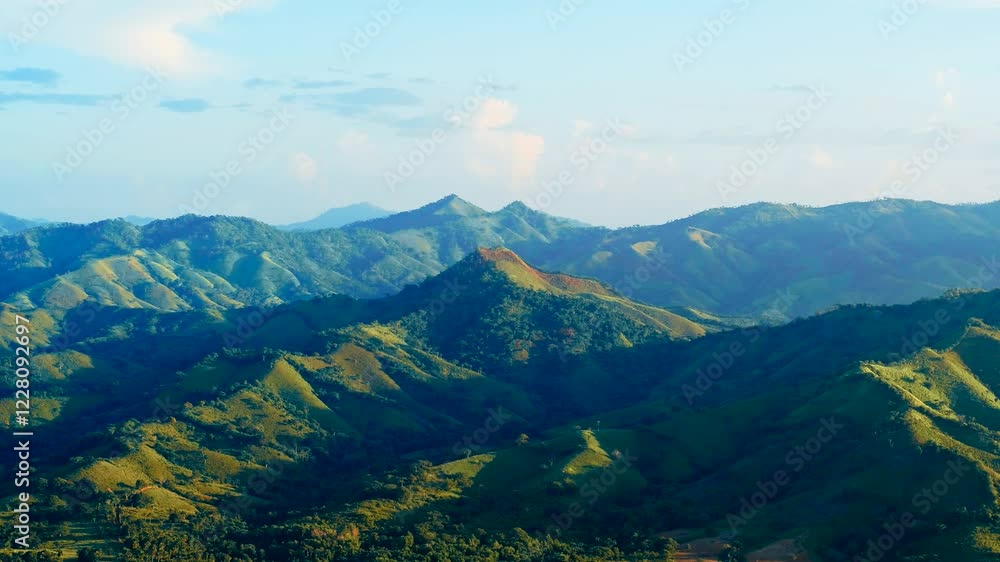 Mountain range and layers of green hills of America on a sunny summer morning. Drone view of mountains under blue sky at sunrise. Beautiful summer landscape. Early morning hues in a sunlit valley. Mountain range and layers of green hills of America on a sunny summer morning. Drone view of mountains under blue sky at sunrise. Beautiful summer landscape. Early morning hues in a sunlit valley.
