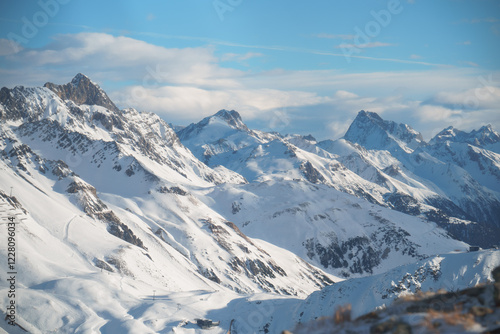 Wallpaper Mural Snowy Kapall peak in Ski Arlberg, Vorarlberg, featuring Kapallrestaurant, Kapallbahn, and Schöngraben lift, with Weißschrofenspitze, Bacher, Hirschpleiskopf, and Schindlerspitze in the background. Torontodigital.ca