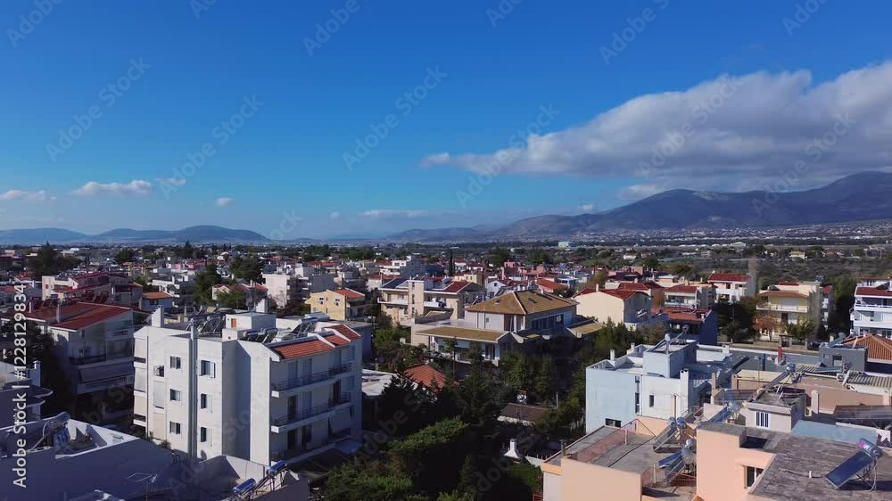 Aerial panoramic view of Parnitha mountain, Athens, Greece, on a sunny day with beautiful cloud formations 4K right pan shot Aerial panoramic view of Parnitha mountain, Athens, Greece, on a sunny day with beautiful cloud formations 4K right pan shot