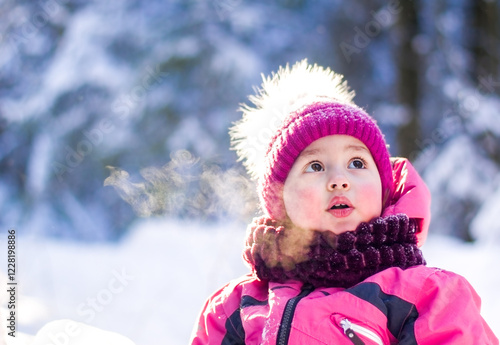 Child in the cold, steam coming out of his mouth