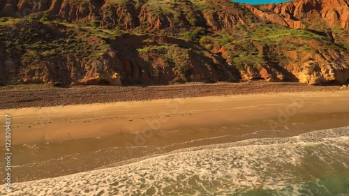 Aerial view of seascape along the vast beach on the South Coast during summer photo