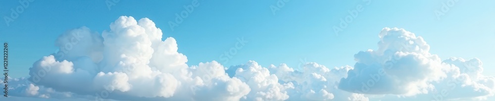 White clouds against a bright blue and grey sky, white clouds, dreamy clouds, atmospheric effects White clouds against a bright blue and grey sky, white clouds, dreamy clouds, atmospheric effects