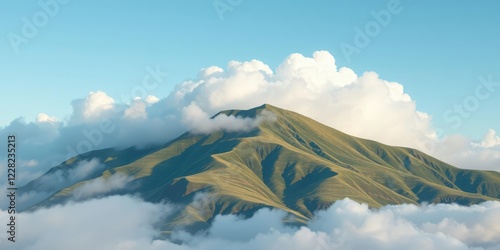 Individual white clouds peek out from behind a hill, solo cloud, cloudy hills